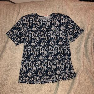 Blue faces Lacoste tee shirt